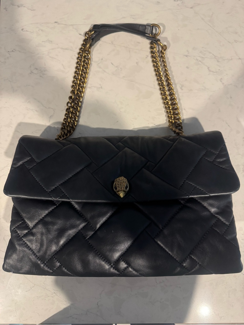 Black Quilted Leather Shoulder Bag with Gold Chain
